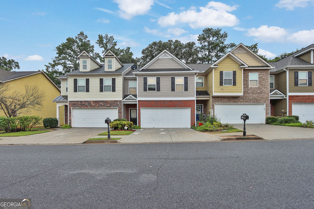 Welcome to this well-maintained and spacious two-story 3-bedroom, 3-bath townhome located in a prime Lawrenceville location! Just minutes from top-rated Gwinnett County schools, this home offers unbeatable access to shopping, dining, and entertainment-just 15 minutes from the Mall of Georgia, and convenient to Highways 85 and 316. Step inside to find gleaming hardwood floors, beautiful custom cabinetry, granite countertops, and a one-of-a-kind built-in aquarium that adds a unique and tranquil touch to the living space. The open floor plan is perfect for both everyday living and entertaining, while each bedroom offers generous space and comfort. Nestled near historic downtown Lawrenceville, you'll love being close to charming shops, restaurants, parks, and local events. Whether you're a first-time homebuyer or looking to upgrade, this home is move-in ready and filled with warmth and character. Don't miss your chance to own this gem in one of Gwinnett's most desirable areas!