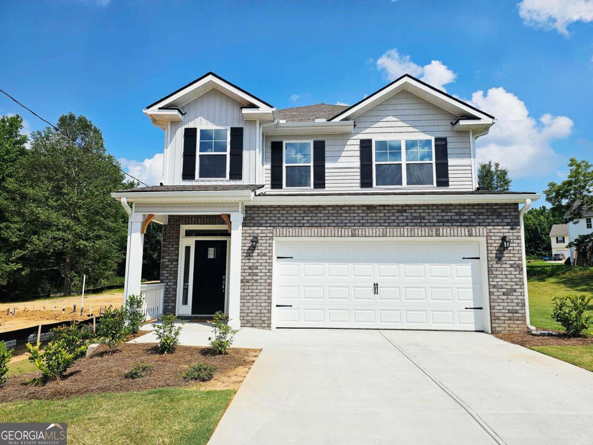 Welcome to "The Haven at Scarlett Place" - Spacious 5BD/3.5BA Cul-de-Sac Retreat! Priced at $148 per sq ft - Imagine living in a home where space, comfort, and tranquility come together. Nestled in a quiet cul-de-sac in the sought-after Scarlett Place subdivision, this 2,709 sq. ft. two-story home is designed to be both a retreat and a gathering place for family and friends. - Picture hosting lively dinner parties in your open-concept living space, where the seamless flow between the bright, airy living room and the modern kitchen makes entertaining effortless. After a long day, retreat to your main-level master suite, a peaceful sanctuary offering privacy and relaxation. - This home is thoughtfully designed with four additional bedrooms upstairs, providing plenty of space for family, guests, or a home office. The versatile recreational room is perfect for game nights, movie marathons, or even a fitness space. Step outside to your covered patio, where you can unwind and enjoy the serenity of cul-de-sac living. - With no HOA, USDA loan eligibility, and just $1,000 in earnest money, this is an opportunity you don't want to miss. Experience the charm of "The Haven at Scarlett Place"-schedule your private tour today!