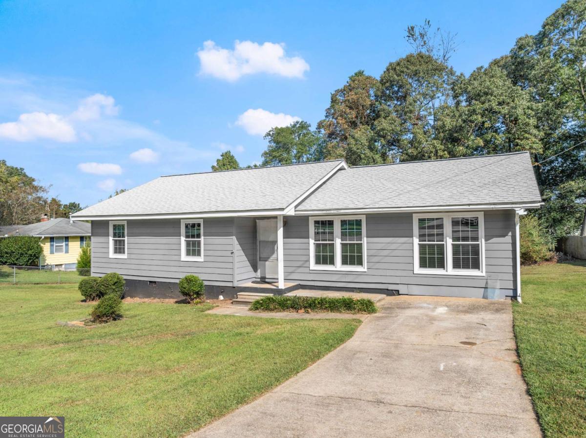 Looking for a home with no HOA? You just found it. This well maintained, almost completely, renovated ranch located in Gainesville is ready for a new owner. This home features updated bathrooms and flooring throughout. The roof and windows were replaced in 2023. The kitchen has not been remodeled but is fully functioning. Take your time to update it once you are settled in. With 3 bedrooms and 2 full baths, this home is perfect for a family, for downsizing, or for an investment property. Location is everything and this home is less than 10 minutes to UNG Gainesville, shopping and dining options, I-985 access and so much more. Come and take a look at what this property has to offer. Estate Owned-Sold AS-IS.