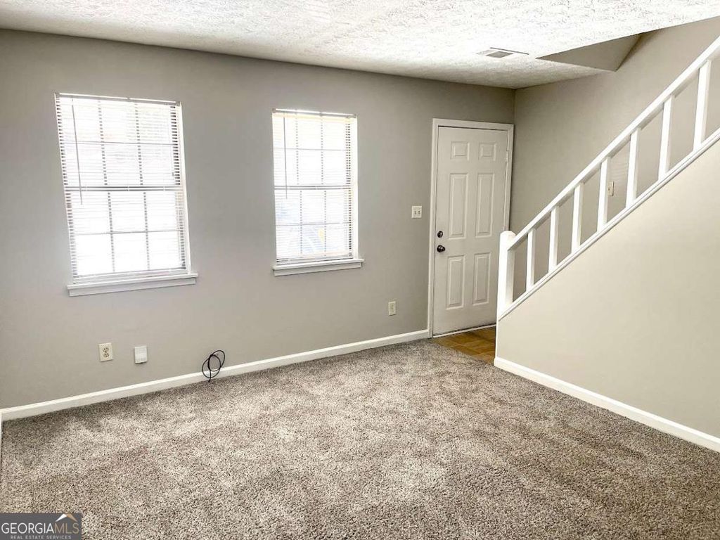 Photo of 120 Meadowbrook Court #UNIT C, Fayetteville, GA 30215 (MLS # 10774603)