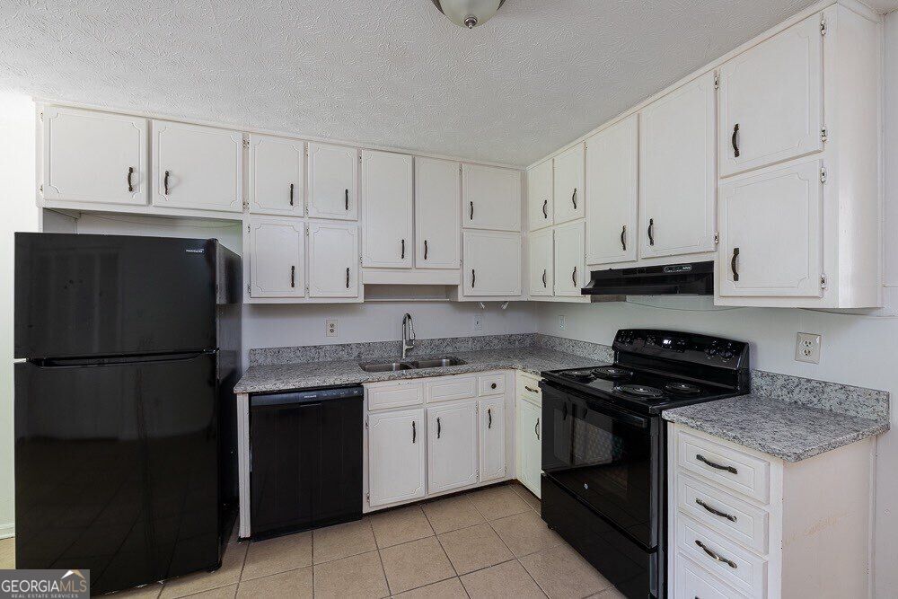 Photo of 8165 Magnolia Drive, Jonesboro, GA 30238 (MLS # 10872032)