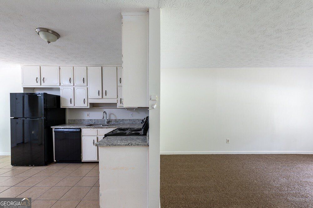 Photo of 8165 Magnolia Drive, Jonesboro, GA 30238 (MLS # 10872032)