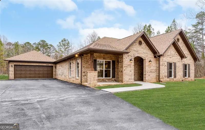 Welcome to your future dream home at 111 Stewart Avenue Northeast, Milledgeville, GA! This upcoming new construction offers an exceptional blend of modern design and thoughtful amenities, perfectly situated on a sprawling lot of nearly an acre and a half, providing you with ample space to create your ideal living environment. Step inside this expansive 2,803 square foot residence that promises to deliver four well-appointed bedrooms and two luxurious bathrooms. Designed with contemporary living in mind, each space within this home is crafted to maximize comfort and functionality. The open floor plan invites natural light to flow seamlessly throughout, enhancing the sense of space and elegance. With spacious and stylish bathrooms, each one is designed as a private sanctuary, complete with modern fixtures and finishes that provide both style and durability. The generous lot size of 27,007 square feet enhances the property's appeal, providing opportunities for outdoor entertainment, gardening, and more. Envision your lifestyle unfolding in a serene setting that balances convenience with the tranquility of a private retreat. Whether you're hosting gatherings or enjoying peaceful moments, this home is poised to be a haven of comfort and style. Don't miss the chance to make this remarkable house your new home!