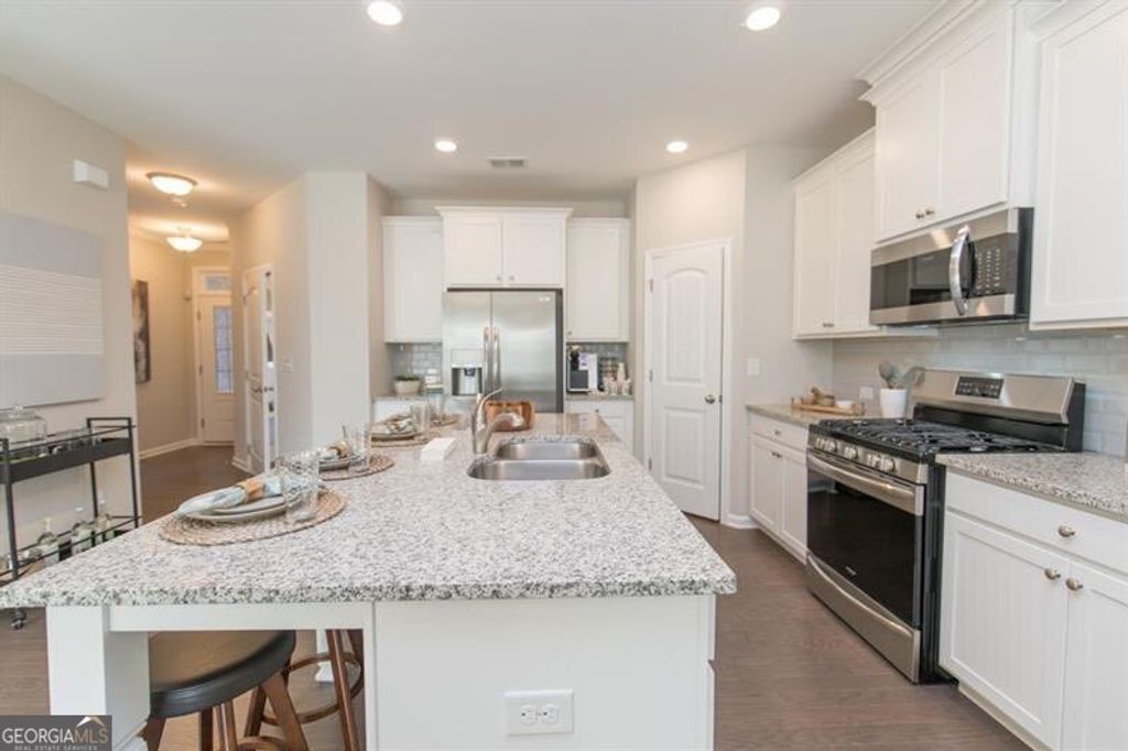 Photo of 1626 Lansing Bluff Walk #1626, Lawrenceville, GA 30043 (MLS # 10706469)