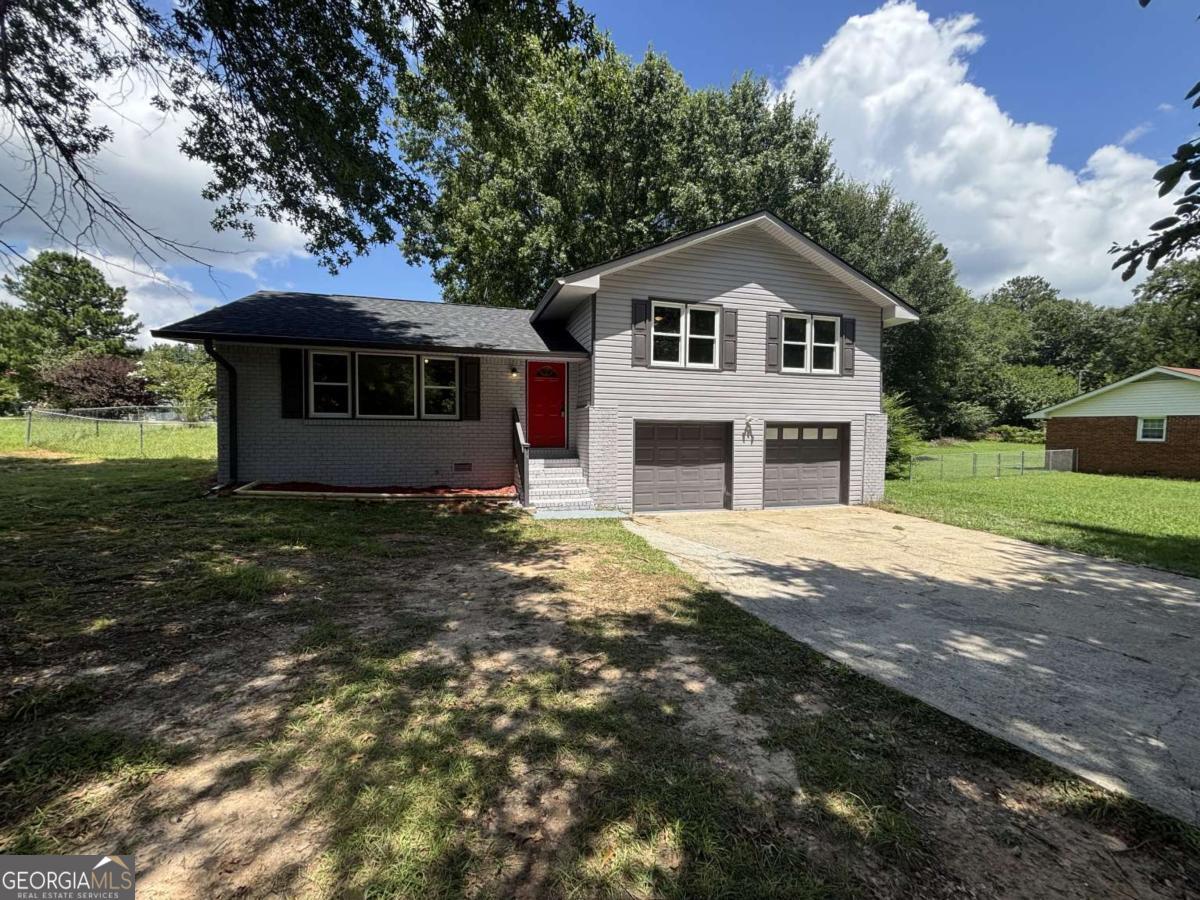 The seller is very motivated to sell so ask about concessions offered! Beautiful 3 bedroom and 2 full bathroom. The home is completely rehabbed by true craftsmen. Brand new everything- interior and exterior. Too many brand new features to name- Interior and Exterior Paint,Entire Kitchen, Stainless Steel Appliances, Quartz Countertops, Backsplash. Both bathrooms Updated. New Roof ,, New Hvac Systems, New Electrical Fixtures , New LVP Flooring !