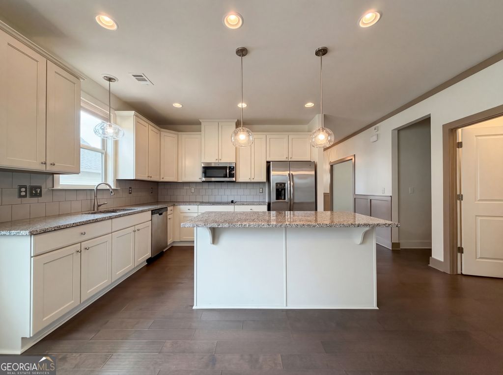 Photo of 1027 Halletts Peak Place, Lawrenceville, GA 30044 (MLS # 10728052)