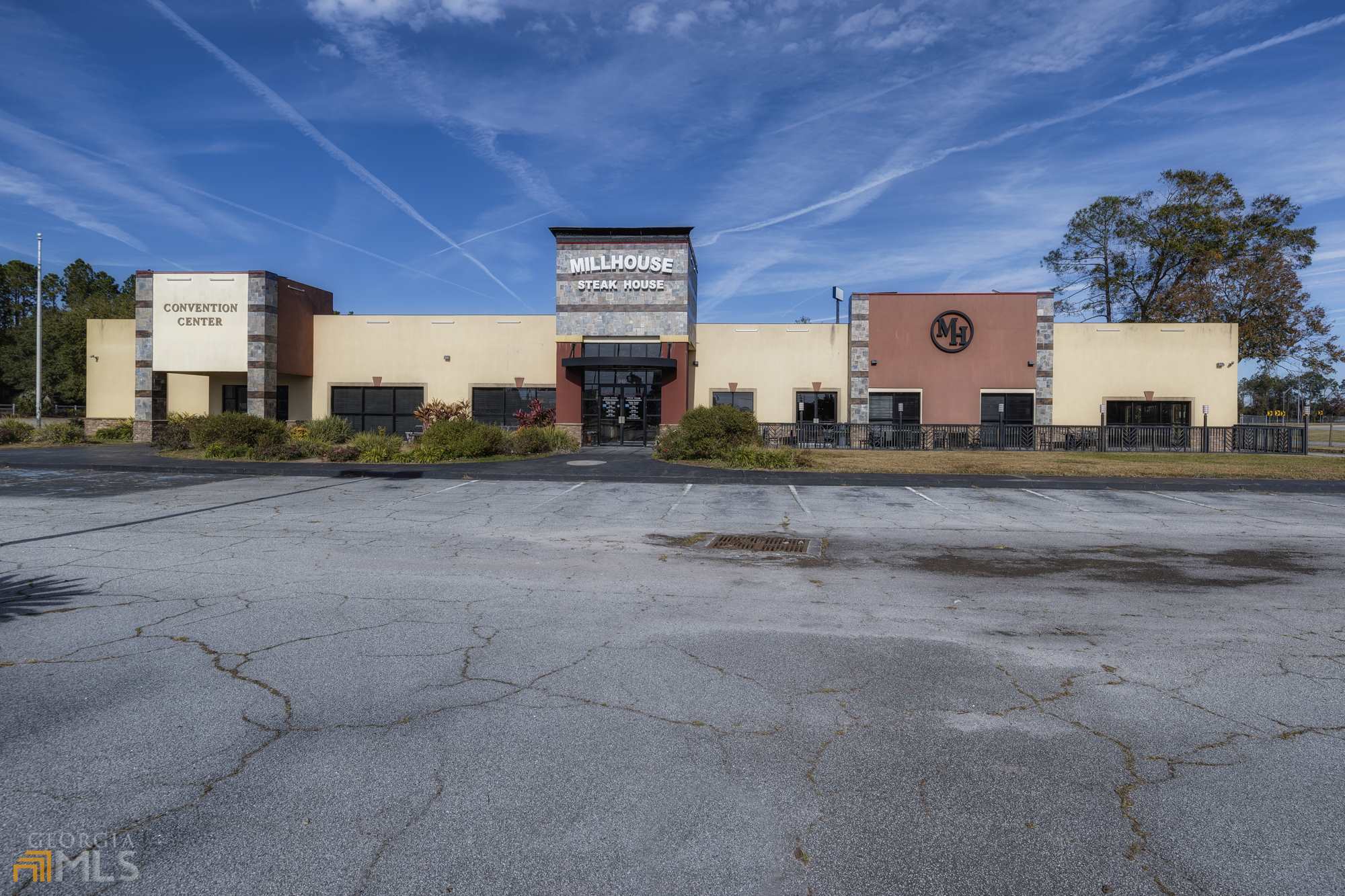 There is no better commercial location in Camden County, GA than this almost 7 acres located on the off ramp of Exit 3 on I-95 on Georgia Hwy 40!  Full service hotel complete with pool, banquet facility, full service restaurant with bar, plenty of parking, and upwards of about 150 keys available encompassing 5 buildings!  Environmental inspections and surveys were completed last spring. The land value alone exceeds the list price, and for those who may be looking for vacant land, it will cost $261,800 to remove everything from the property except for dirt and blue skies! Fantastic opportunity for a growing area, 20 minutes north of the Jacksonville International Airport. Current businesses at exit 3 include Crackle Barrel, Starbucks, Denny's, I-Hop Lowes, Winn Dixie, Chik Fil A, McDonalds, Burger King, Hampton Inn & Suites, LaQuinta Inn, and many more!