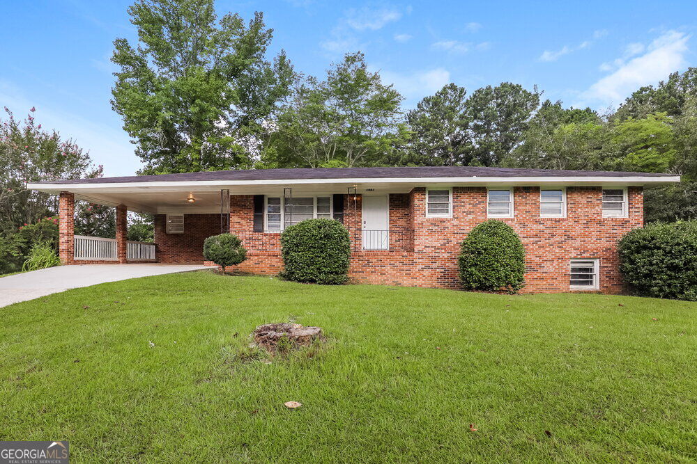 Photo of 7487 Grayson Drive, Riverdale, GA 30296 (MLS # 10833394)