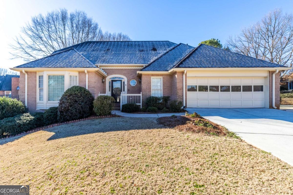 Welcome home! All-brick one-owner traditional Chathambilt executive home located in Alpharetta's sought after and highly desirable North Farm community. Master-on-Main with two additional bedroom upstairs. Full partially finished basement. This one is a rare find as it features an extended driveway that wraps around the home leading to the terrace level garage. Perfect for those folks who have a vintage car or boat that they wish to keep handy at home. Cul-de-sac homesite with gently sloping yard. Entry foyer leads into vaulted greatroom with masonry fireplace and beautiful wainscot trim. Formal dining room is just a step away through a cased opening and features three large windows to let the sun shine it. Kitchen has been updated with stained cabinetry, granite countertops & stainless appliances. Keeping room with brick paver flooring, built-in desk and two whole walls of windows make the heart of this home open and bright! Very spacious Master-on-Main with completely updated primary bath which features double vanity dressing area plus wet area with soaking tub and separate shower. Reconfigured so that it can be easily used with wheelchair access. Two additional bedrooms and guest bath upstairs along with spacious walk-in attic storage - no need for disappearing stairs. Full basement has large finished multi-use room with masonry fireplace and sliding glass doors to backyard. Could be TV entertainment area, exercise room, study or office, kids toy area or even used as space for live in nanny or visiting friends or inlaws with private bath. Unfinished storage, a workroom and 1-car basement garage! North Farm is a highly desirable community known for quality construction and community feel. Swim/tennis amenities to be enjoyed. Active HOA. North Farm is conveniently located near shops, restaurants and only a five minute drive into downtown Crabapple with all its charm! Award winning North Fulton schools: Crabapple Crossing, Northwestern and Milton.