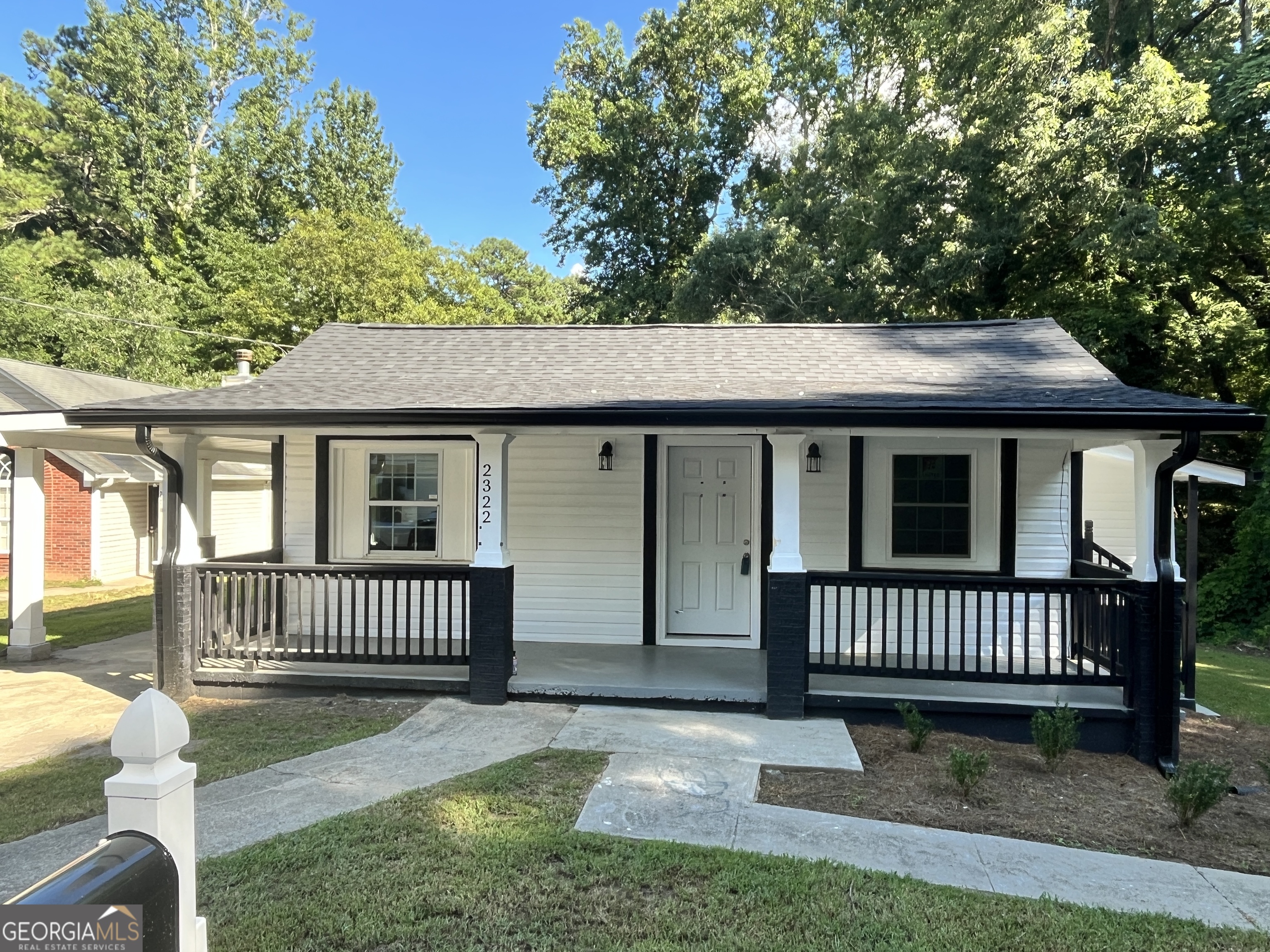 Welcome to 2322 Ewing Street SW-where charm, comfort, and convenience come together in one beautifully updated home. Thoughtfully renovated and priced at just $199,000, this 3-bedroom, 2-bathroom retreat offers the perfect opportunity to start your next chapter in a quiet, tucked-away corner of Atlanta's Ben Hill Highlands. From the moment you arrive, you'll feel the warmth of this home's inviting curb appeal. Step inside to a light-filled living space with fresh flooring, a modern neutral palette, and a layout that just makes sense. The kitchen and bathrooms have been stylishly updated, giving you the feel of a new home without the new-home price tag. Each bedroom is comfortably sized, and the primary suite offers the perfect place to unwind after a long day. Outside, the backyard is private and peaceful-ideal for cookouts or simply relaxing on the weekends. You'll also appreciate the convenience of a carport and a quiet, neighborly street with easy access to public transportation, schools, and major highways. This is more than just a house-it's a chance to build something meaningful. Whether it's your first home or your next move, this one is ready to welcome you. Schedule your private showing today and come see what makes this one feel like home.