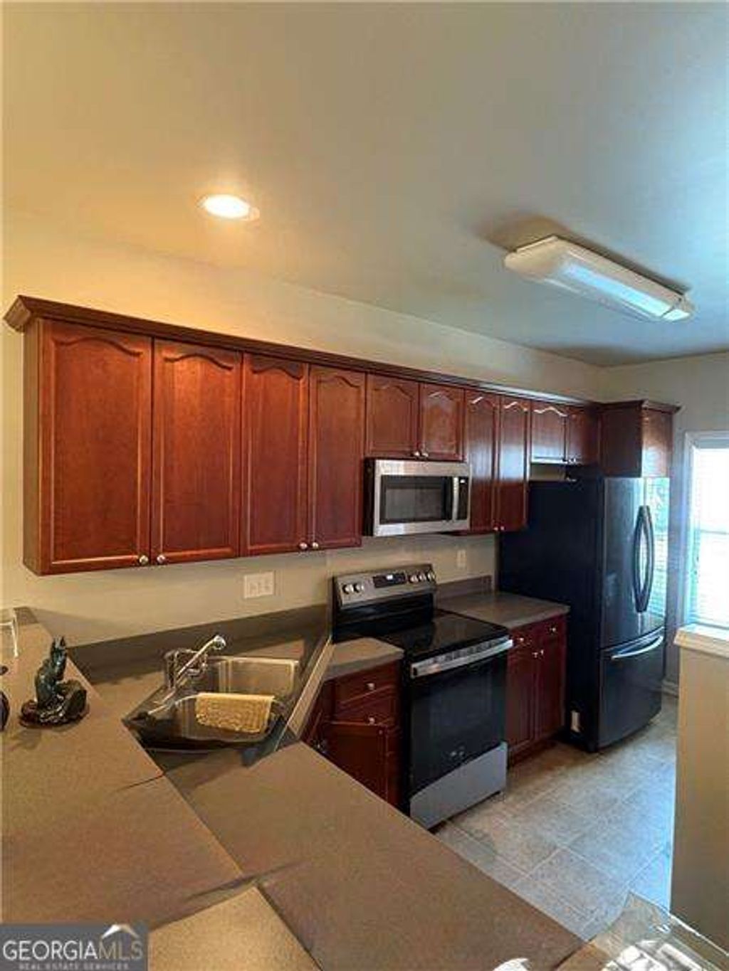 Photo of 2450 Clock Face Court, Lawrenceville, GA 30043 (MLS # 10703313)