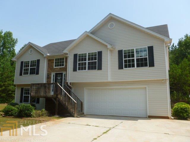 Prefect home for a large family with this 5bd/3bt house located in Nature Walk Subdivision. One of two homes in the subdivision that sets back off the road for privacy. Cozy up to the fireplace in the family room on those cold days and enjoy time with the family or have a cookout on the deck on those warm days. Lovely cherry cabinets and granite countertops in the kitchen with a large breakfast area. New flooring is needed in some areas which gives you an opportunity to put down just what you like. Sold As Is.