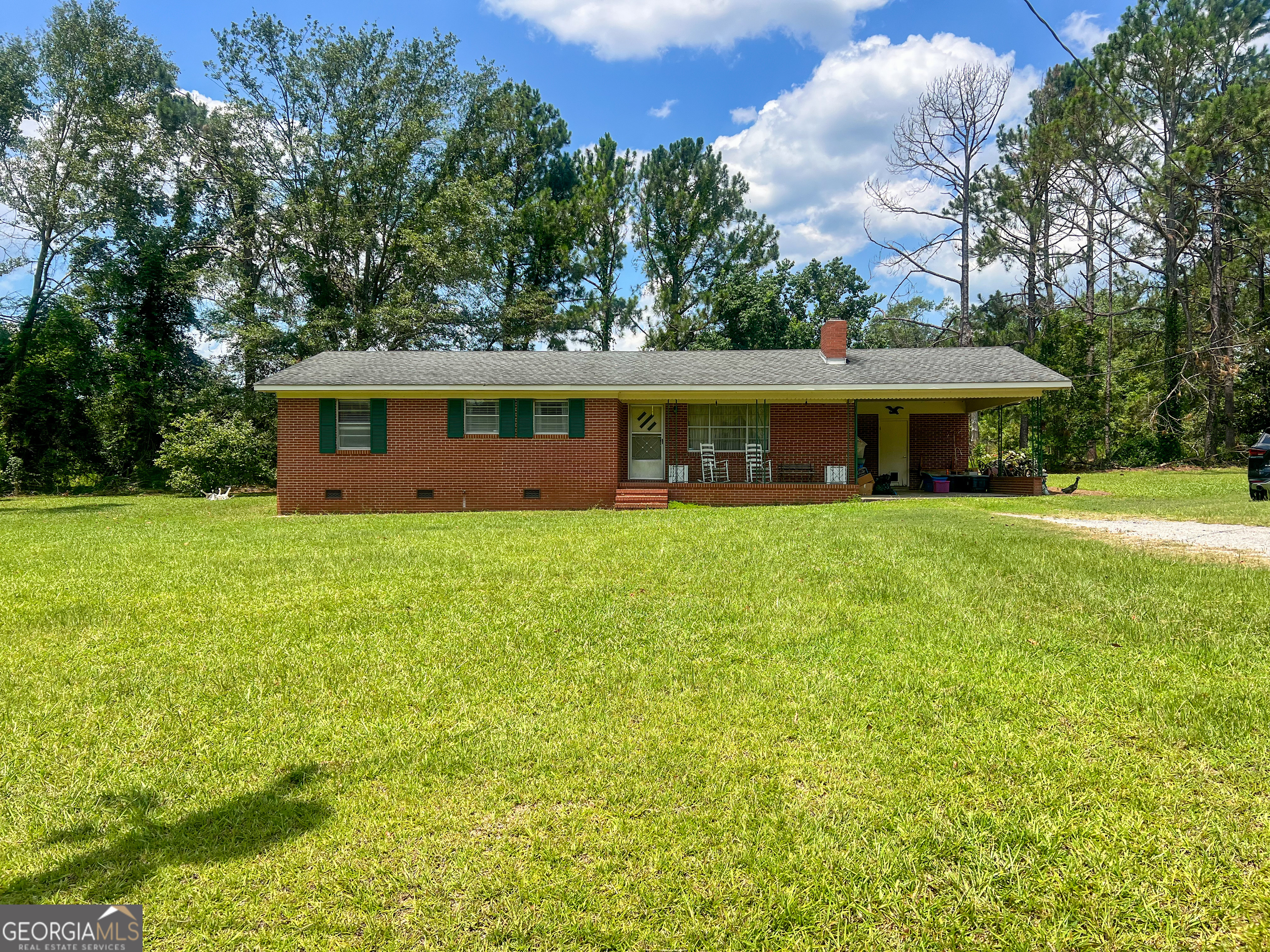 Charming 3BD/1BA Homestead in Treutlen County, GA - Just Minutes from the Interstate! Welcome home to this charming brick 3-bedroom, 1-bath retreat set on a peaceful 1-acre lot. You'll be greeted by the beauty of a stately magnolia tree and the warmth of a classic Southern homestead. Inside, enjoy a comfortable layout featuring spacious living areas and a walk-in shower for added convenience. Outside, a shed nestled off to the side of the property offers the perfect space for storage, hobbies, or a workshop. Located just minutes from the interstate, this property combines the tranquility of the country with quick access to town-truly the best of both worlds! Interior Photos will be added once the Estate Sale is finished - Mid July. Contact me for a showing! Home is ready to be shown as of June 24th! (843) 422-8205 ***** NOT FOR RENT!