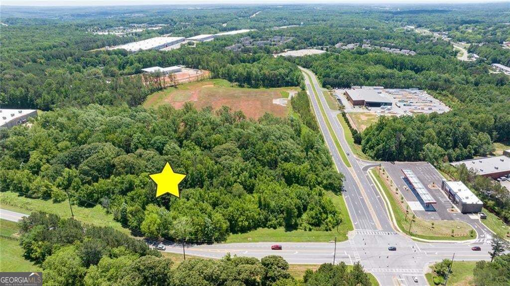 Photo of 4611 Thurmon Tanner Road, Flowery Branch, GA 30542 (MLS # 10868149)
