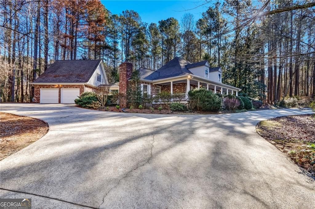 Photo of 344 Lost Creek Drive NW, Kennesaw, GA 30152 (MLS # 10661944)