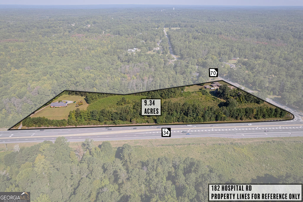 This 9.34 acre corner lot fronting the Highway 34 Bypass and Highway 70 (Roscoe Rd) is a prime commercial development opportunity in the city limits of Newnan, Georgia. This truly is a rare opportunity for visionary developers and investors seeking a strategic location with unmatched accessibility as this property has direct access from the high-traffic 34 Bypass as well as access via Hwy 70/Roscoe Road. This strategic positioning ensures maximum visibility and effortless ingress/egress for future customers and supply chains. The site is ideally suited for a variety of commercial ventures, including: major grocery store chain, retail development, mixed-use complex, etc. With its generous acreage and flexible zoning, the possibilities are limited only by your imagination. Newnan, known as the "City of Homes," is experiencing rapid growth and development. Its strategic location just 40 miles southwest of Atlanta makes it an attractive destination for businesses looking to capitalize on the expanding metro area while maintaining a charming, small-town feel.
