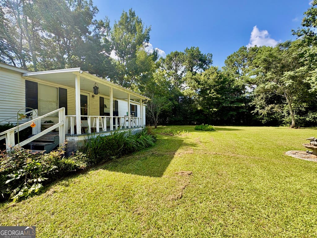Photo of 390 Peach Road, Byron, GA 31008 (MLS # 10799591)