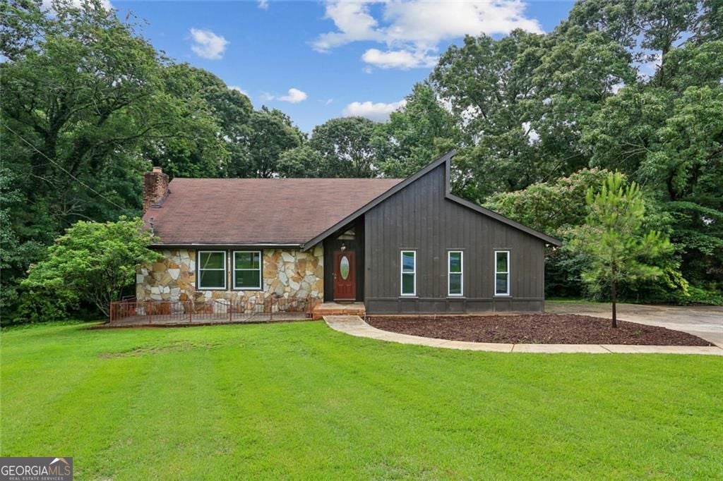 Photo of 5460 Chanterella Court, Lilburn, GA 30047 (MLS # 10804630)