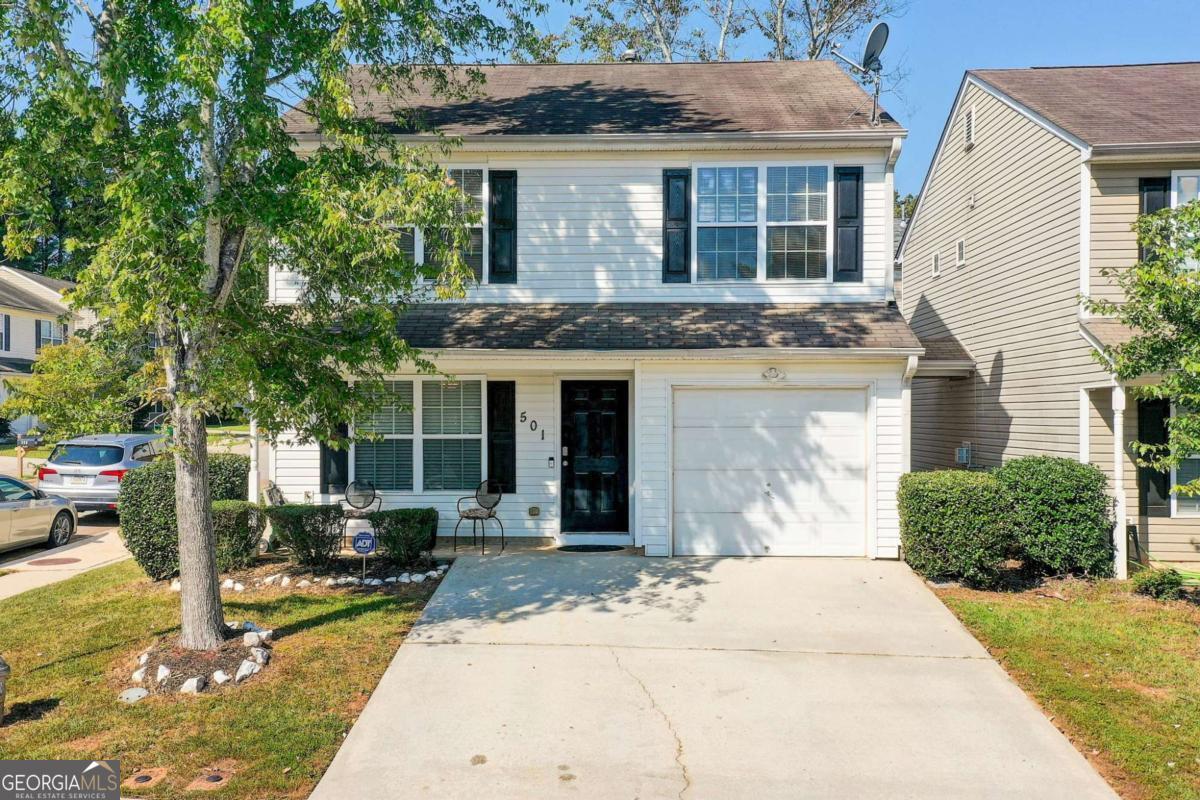 Welcome to this inviting two-story townhome in McDonough. This property features a spacious family room with fireplace, an eat-in kitchen with black appliances, and a convenient half bath on the main level. Upstairs offers a large master suite with private bath, a laundry room, and a split bedroom plan for added privacy. With 3 bedrooms and 2.5 baths, this home is perfect for comfortable living. Move-in ready and located near shopping, dining, and major highways. Don't miss this one!