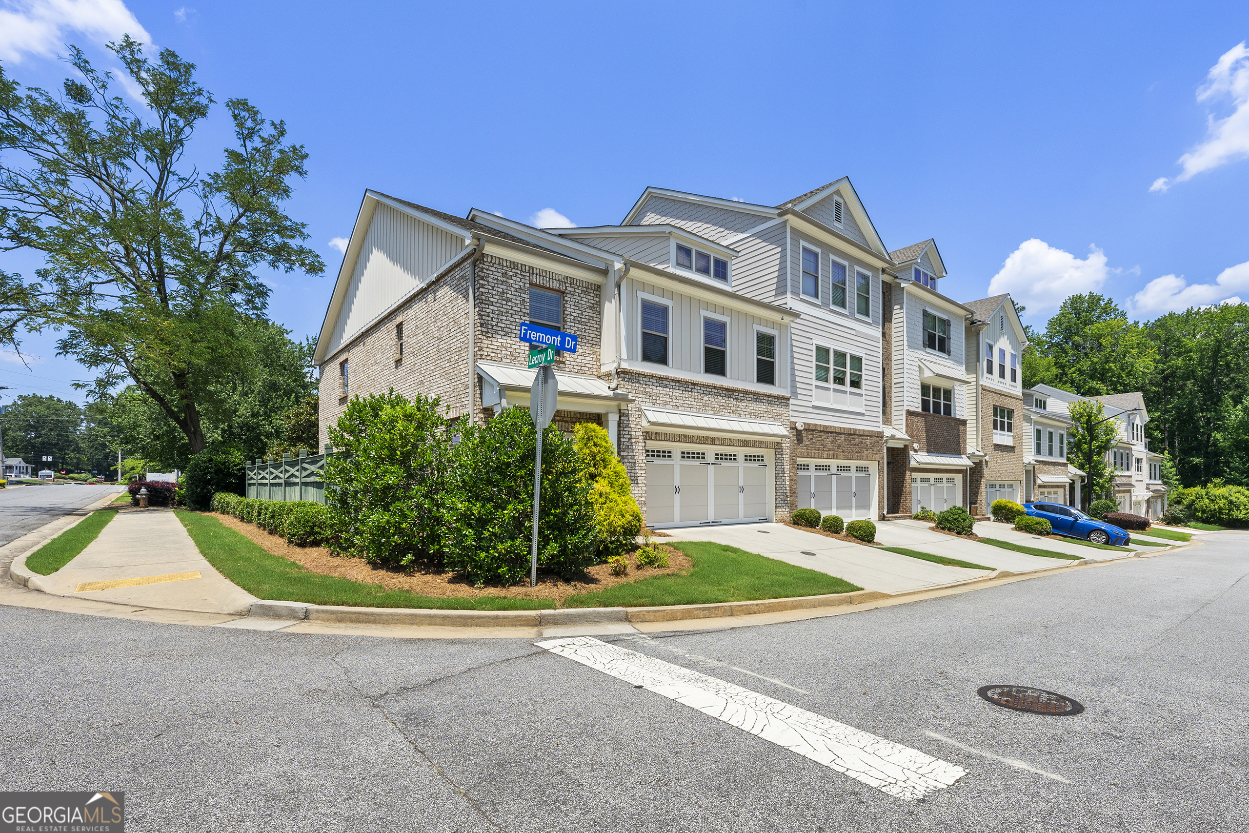 Located in the highly rated Wheeler High School district and just 5 minutes from I-75, this elegant 3-bedroom, 3.5-bath townhome offers 2,511 sqft of upgraded living in one of Marietta's most desirable communities. This former model home is positioned right at the community entrance and shines with premium touches throughout - from the south-facing natural light and open floor plan to hardwood floors and a cozy electric fireplace. The kitchen features Whirlpool appliances, a gas cooktop, and generous space for entertaining. The primary suite is a true retreat with a private deck, soaking tub, separate shower, double vanity, and two walk-in closets plus a linen closet. Each bedroom includes its own en-suite bathroom, and the laundry is conveniently located on the master level. Additional standout features include: **Double car garage with epoxy floors **Insulated garage doors **Gas heating for HVAC and water **Pre-wired for security **Semi-private backyard HOA covers roof, termite protection and exterior maintenance With modern finishes, thoughtful upgrades, and an unbeatable location near top schools and major highways, this move-in-ready home blends comfort, convenience, and accessibility. Schedule your private tour today!
