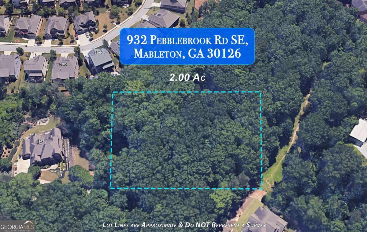 Build your DREAM HOME on this beautiful Two Acre Lot (Lot 3), 932 Pebblebrook Rd, in Vinings Shire, a private enclave of four two-acre properties near the renowned Whitefiled Academy. This pristine property offers exceptional privacy and value. Savor the lush beauty of nature, while being close to the hustle and bustle of great restaurants/shopping, and easy commutes to Buckhead and the Atlanta Airport! This exceptional lot is located on the Smyrna/Mableton line. From the moment you turn into the community you'll get the sense you're heading to a peaceful retreat. Most Atlantans have to drive HOURS to find a beautiful "getaway" spot, and yours will be your own home! You will not find anything else like it! ** Looking for the right custom builder? Discover how Sotto Properties/Paramount, can create your dream home, blending timeless architecture with modern design and elevated, high-end finishes throughout. This is your chance to build a truly special home on a stunning, 2-acre lot in Vinings Shire. Note - the list price is for the purchase of the lot only. Photos are for design inspiration from Sotto Properties/Paramount.