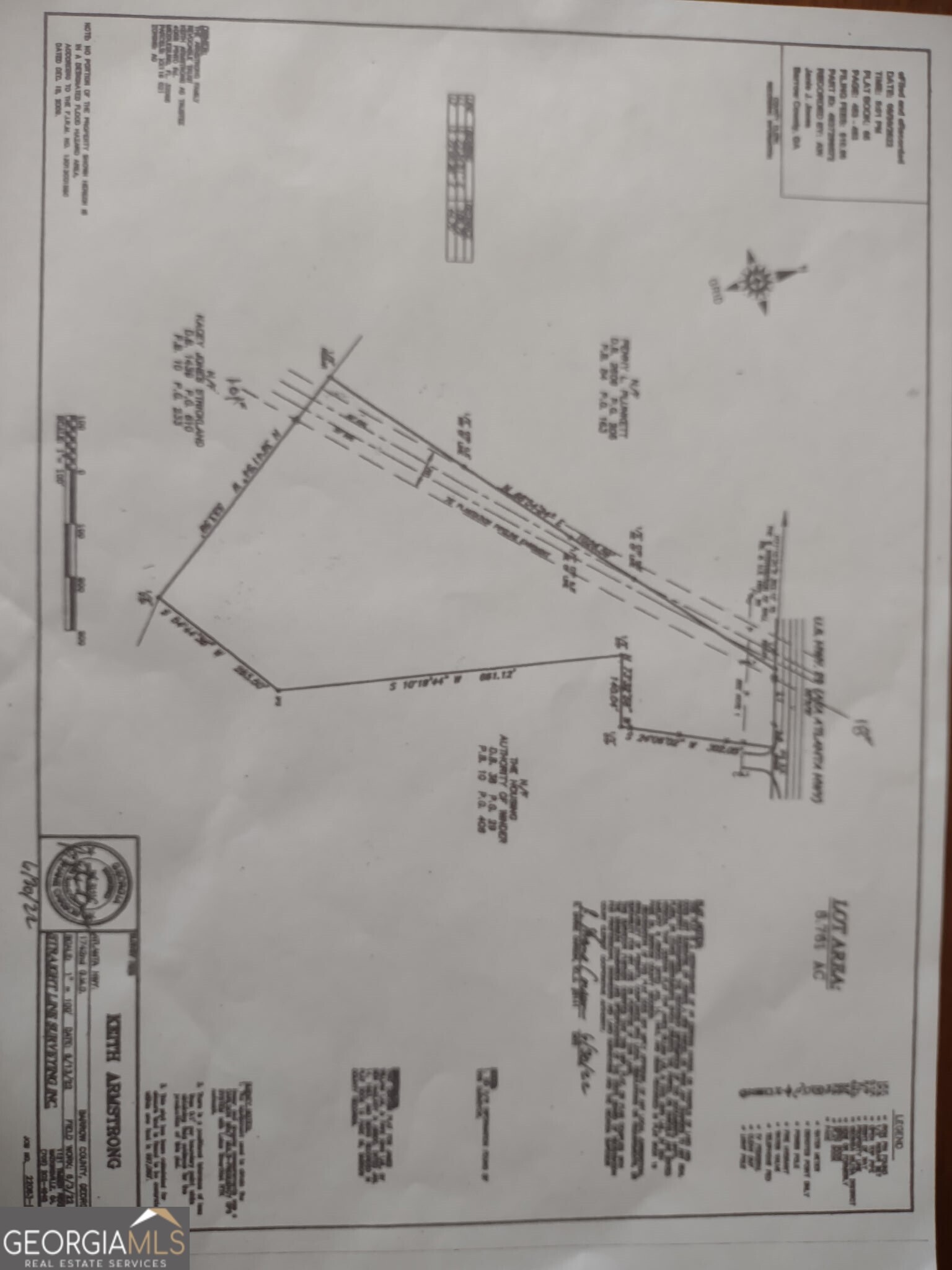 Great opportunity on this 8.76 acre lot with possible commercial zoning. Used presently for commerial enterprise in a 60 X 40 2400 Sq Ft industrial building with 3 phase electricity. With 14 X 14 drive through roll up doors. Water and sewer within close proximity. The lot has 167' road frontage on Atlanta Hwy.