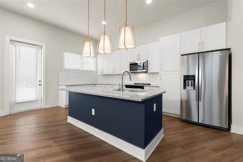 *NOW LEASING* *BRAND NEW CONSTRUCTION* *MOVE-IN SPECIALS* *55+ ACTIVE ADULT COMMUNITY.* Expand your life and start fresh at EVOQ East Cobb. This floor plan features a two bedroom, two bathroom home. Discover the perfect blend of comfort, style, and community at EVOQ East Cobb, a vibrant 55 plus neighborhood designed for active adults and empty nesters ready for a fresh chapter. Nestled in beautiful Marietta, Georgia, this spacious home offers a pet-friendly garden-style setting with luxurious amenities that make every day feel special. Step inside and enjoy thoughtful features like a private balcony, high ceilings, and a full-size front-load washer and dryer, all designed to complement your lifestyle. Whether you are relaxing poolside after a water aerobics class, spending time with neighbors, or simply enjoying quiet moments at home with your furry companion, EVOQ East Cobb is where you can truly thrive. Here you will rediscover passions, explore new interests, and live life on your terms. This is more than just a place to live, this is where you belong. Ready to make your move? Let your next chapter begin at EVOQ East Cobb. Photos are representative of model home, and not actual home. Listing address is actual address of home.