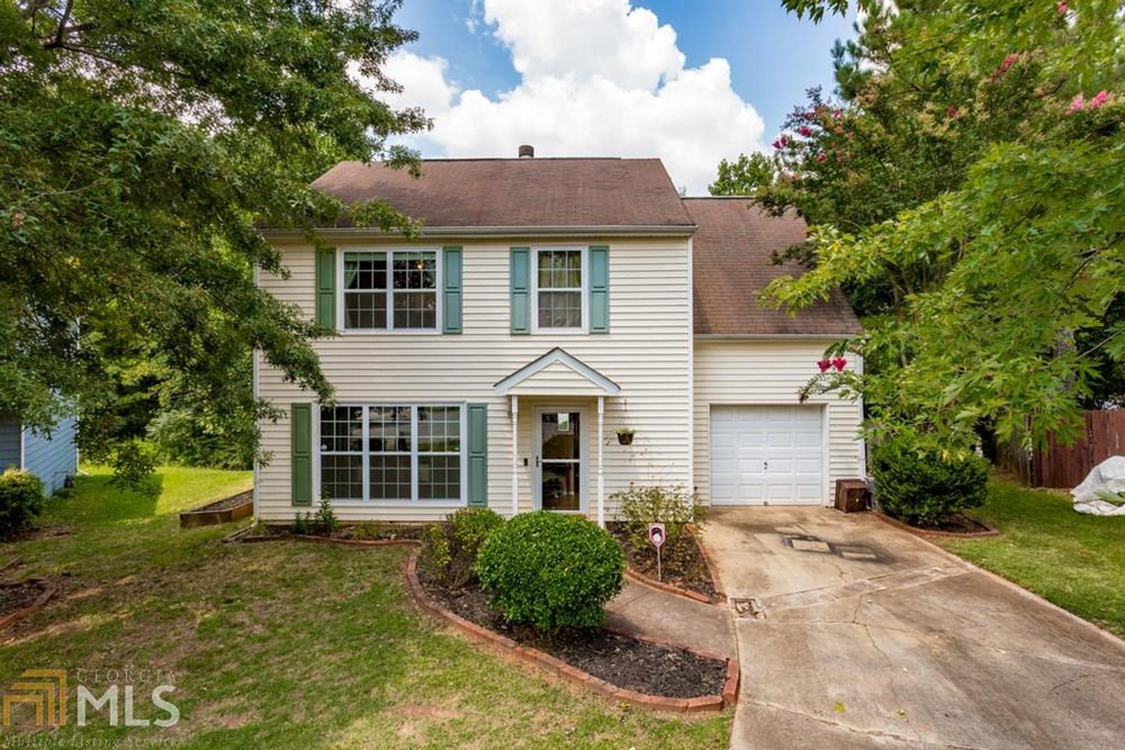 Fantastic investment opportunity, perfect for first time homebuyers or rental income. Quiet neighborhood close to schools, minutes from shopping and access to the Silver Comet Trail. This 3 bedroom, 2.5 bath home includes a tankless water heater, nest thermostat, fireplace and deck across the back of the home with wooded backyard for privacy. Also includes 2-10 Home Warranty. SOLD AS IS.