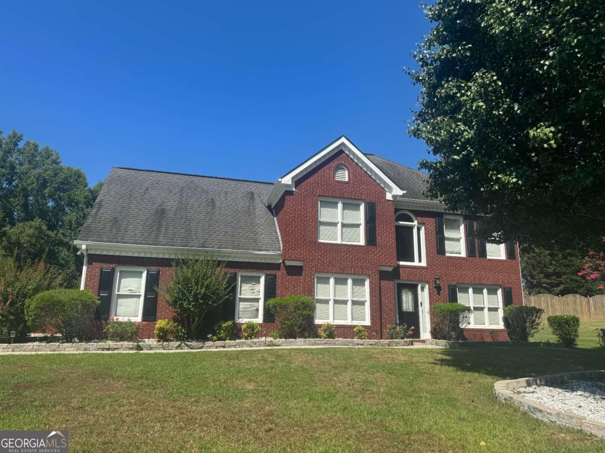 This Pinterest perfect sunny and bright two-level colonial style house is located on one of Gwinnett County's most notable streets. Featuring a spacious living room with tree large bedrooms. Makeover, 2.5 bathrooms, along to an enormous back yard with above ground pool, great for entertaining. Prime location combined with the desirable with Loganville school's district. This home. This home is not to be missed!