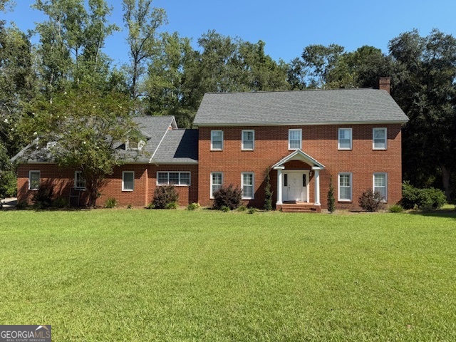 Welcome to this stately brick Colonial-style home, set on a beautiful open lot with mature trees and a sprawling front lawn. This spacious residence blends timeless character with comfortable living, offering multiple gathering spaces and a classic floor plan. Step inside to find a cozy living room featuring a brick fireplace, wood-paneled walls, and French doors that open to the outdoors-perfect for both relaxing and entertaining. The large kitchen is filled with natural light from a wide window overlooking the yard and provides abundant cabinetry, double ovens, and modern stainless steel appliances, making it an ideal space for both everyday meals and hosting family gatherings. With its traditional charm, roomy interiors, and expansive lot, this property offers endless potential to create your dream home in a serene setting. All contracts and offers are subject to final review and approval by seller. ** Contracts are not binding unless the entire agreement is ratified by all parties. ** All offers must be submitted by the buyer's agent via HUBZU AUCTION www.hubzu.com. Once the offer has been accepted through HUBZU the assigned Asset manager from Altisource will upload through Res.net to generating contract addendums. *Please note all offers are subject to HUD approval and must have a valid appraisal to close** Seller Pays" Seller Pays: Buyer uses Premium Title Services, the seller's preferred title partner and closing agent. This lets the buyer bypass the title insurance fee, related search costs and reduced escrow/settlement fees, since the seller will cover those charges. The average charges for title search and insurance is $1225 & escrow/settlement fees is $875, resulting in an overall savings of ~$1660 for buyers, who opt for Premium Title Services.