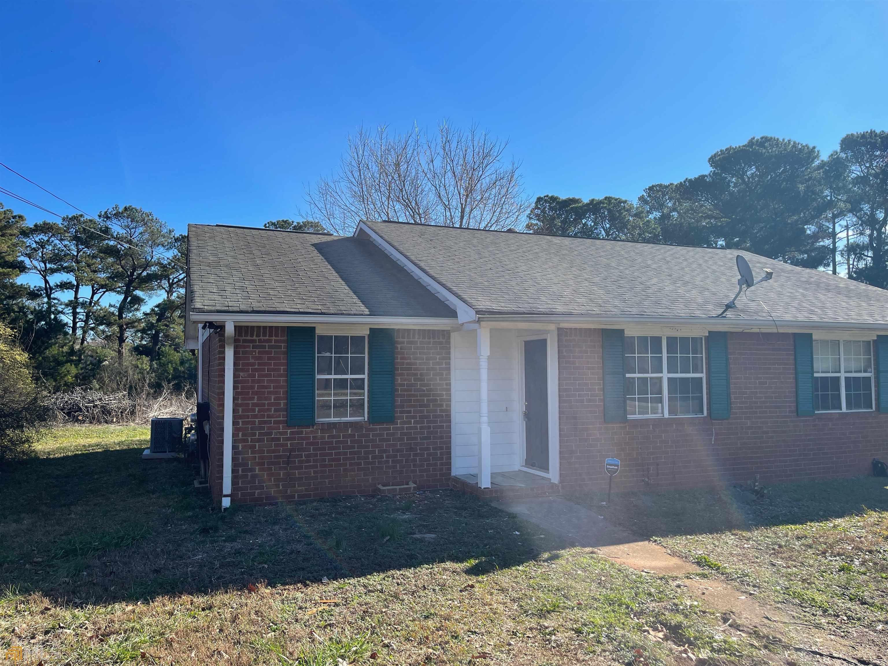 JUST RENOVATED - Including stainless steel appliance package and new flooring throughout. This home has a nice layout to include a front living area that leads to a large eat in kitchen with laundry area. Both bedrooms are large and share a full hall bathroom. New Paint, new, shower, new granite counters and more!