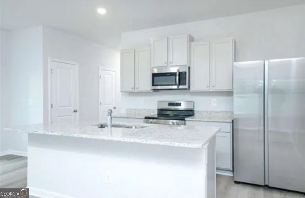 Photo of 141 Village Green Drive NW, Adairsville, GA 30103 (MLS # 10771150)