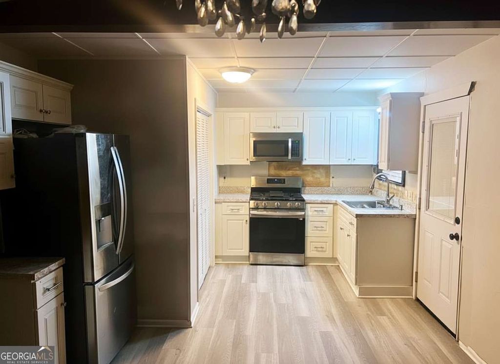 Photo of 673 Lyric Way NW, Atlanta, GA 30318 (MLS # 10690751)