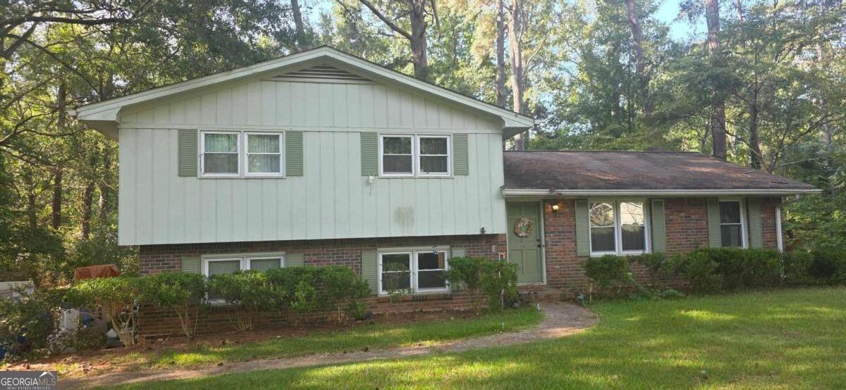 Welcome to 2051 Forest Dr, Fayetteville, GA - a charming split-level brick home in a quiet, family-friendly neighborhood. Situated in the highly sought-after Bennett's Mill school district with an impressive rating of 8 out of 10, this home offers both comfort and convenience. The property boasts a lovely yard, perfect for outdoor activities or relaxing in peace. Inside, you'll find a well-maintained space with no concerns regarding foundation, electrical, or plumbing. The roof is around 12 years old, the HVAC system is just 3 years old, and the water heater is 8 years old, ensuring peace of mind for years to come. The seller will be removing most of the items inside the home, leaving you with a clean slate to make it your own. Whether you're a growing family or looking for a peaceful retreat, this home is ready to welcome you! The interior photos have been generated with AI to show what the home will look like once the furniture has been removed. We have a new investor loan program with great rates and terms, please contact us to find out more, we can get your approved in 24 hours. (HOME INSPECTION WAS COMPLETED ON 09/08/2025, request it and we will give it to you for free!) Don't miss the opportunity to make this house your new home. Schedule a showing today! This property is being sold "as is." Prospective buyers are encouraged to perform all necessary inspections and evaluations prior to purchase. House is not vacant!!! Do not use ShowingTime, Agent is ONLY transactional do not reach out to him, our info is in private remarks, Check out the really good 3D Matterport virtual tour! It shows you everything! Property Problem Solvers will help you solve your problem, for more details get in touch with us!