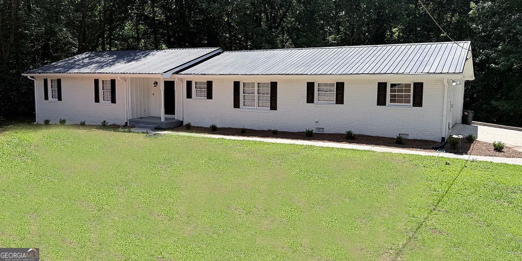 Photo of 1912 Wildwood Court SW, Conyers, GA 30094 (MLS # 10810932)
