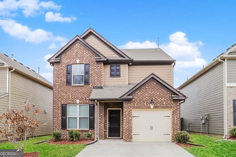 Photo of 5817 Grande River Road, Atlanta, GA 30349 (MLS # 10641605)