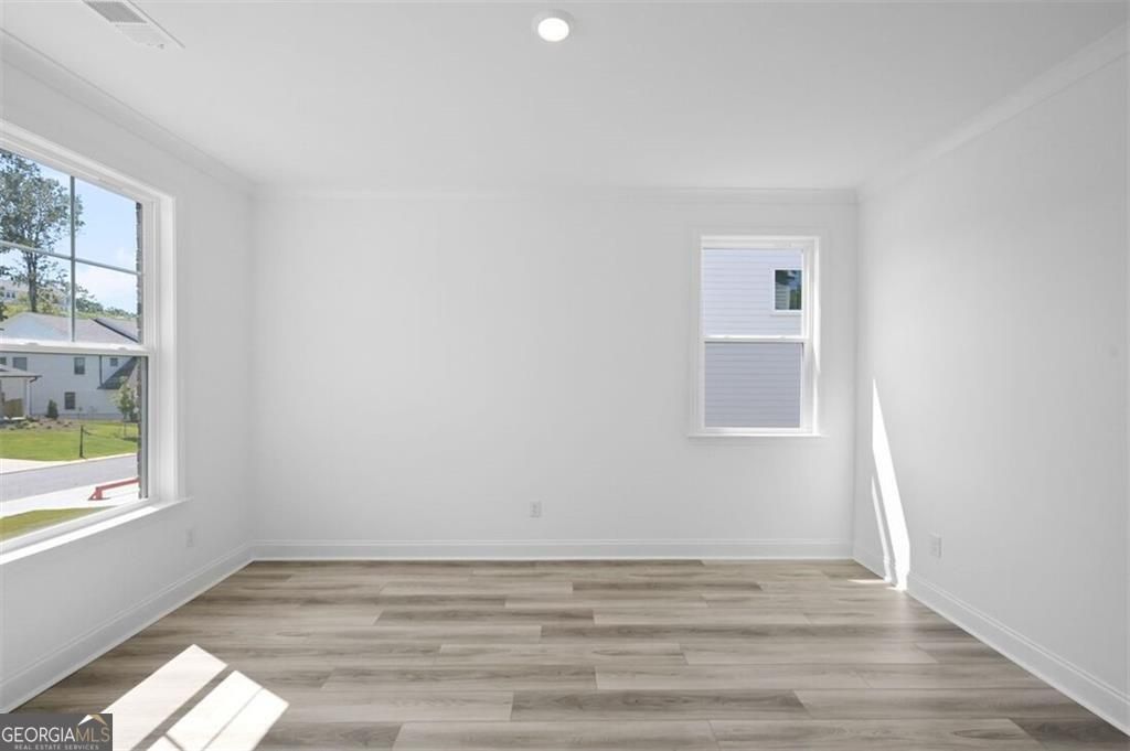 Photo of 8670 Stratford Oaks Avenue, Ball Ground, GA 30107 (MLS # 10664409)