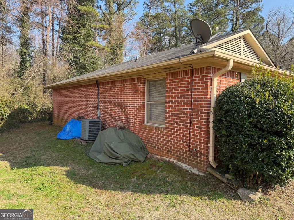 Photo of 1628 Riverside Trail NE, Conyers, GA 30013 (MLS # 10716967)