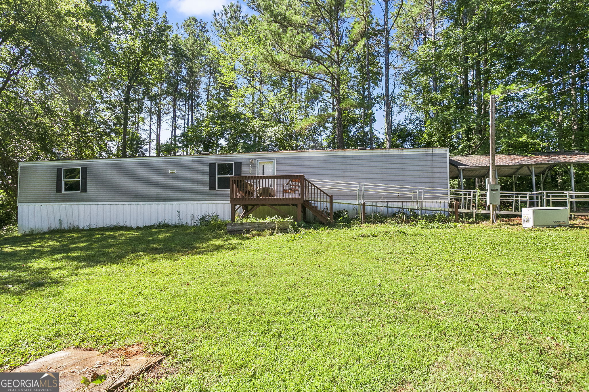 Check out this well maintained 2017 mobile home on 3 acres (land is included in sale!). This property contains the following items updated less than a year ago: paint, LVP flooring, appliances, HVAC, generator, covered parking, and storage shed. This 3 bed/2bath home combines modern living with the tranquility of nature, offering an ideal retreat for anyone seeking a spacious and serene environment. The expansive land is perfect for outdoor activities, gardening, or potential future expansion. There is plenty of space for multiple vehicles, and all essential utilities are connected and functioning. This home is ready to welcome you before summer ends! Reach out for more information.