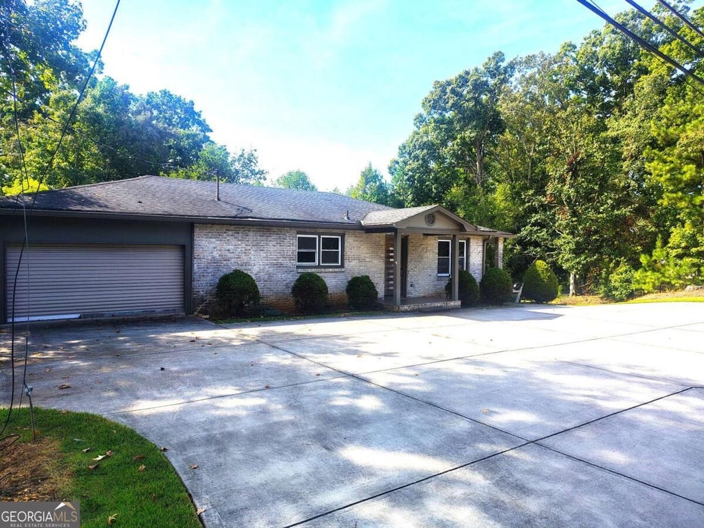 Photo of 5638 Lake Acworth Drive NW, Acworth, GA 30101 (MLS # 10851223)