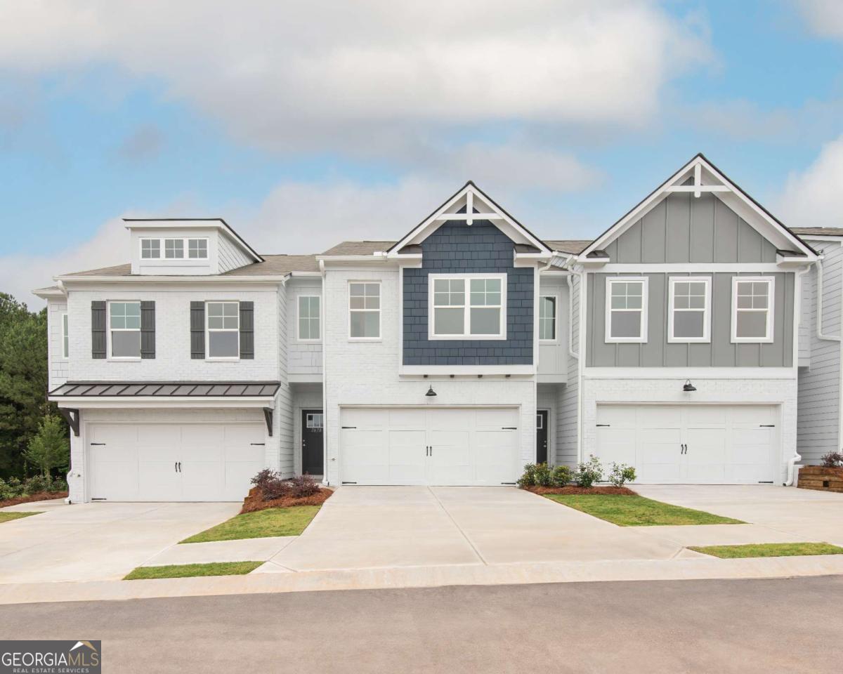 Enjoy Maintenance Free Living in this Beautiful New Swim Community Located In Conyers- Escape the Hustle and Bustle off the City Yet Conveniently Located Off I-20 Minutes From Shopping, Dining and Georgia Horse Park. The Hanover End Unit Model Offers 3BD/2.5 BA W/Two Car Front Entry Garage, Private Wooded Backyard, A Gourmet Eat-In Kitchen White Cabinets, Walk-In Pantry, Granite Countertops, Huge Island, Overlooking Cozy Family Rm, Great Open Concept For Dining and Entertaining w/Luxury Vinyl Plank flooring, Upstairs Offers Two Oversized Secondary Bed RMS W/Walk-In Closets, Laundry Closet, Inviting Spa Owners Suite W/Tray Ceiling, Sitting Area, Huge WIC Closet, Raised Vanity W/Dual Sinks, Granite Countertops, LVP Floor, Relaxing Garden Tub, Separate Walk-In Shower, A Spacious Loft/Game RM Great For Entertaining Or Perfect Home Office. *Photos of Similar Decorated Model. Home is under construction will be move in Ready December.