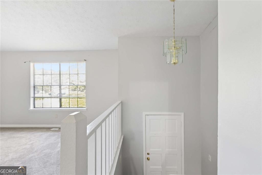 Photo of 7055 Hania Drive, Fairburn, GA 30213 (MLS # 10811520)