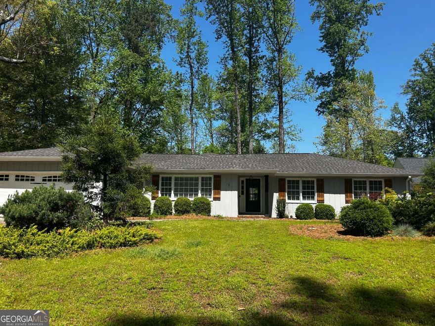 Welcome to this amazing 3 bedroom, 2.5 bath  Ranch home in the heart of downtown Alpharetta. This home has been totally renovated, and will take your breath away. The huge great room with a chef's kitchen, fireplace & wet bar that opens into the beautiful sun room is a entertainers delight. Large living room/den. Gracious primary bedroom. Updated primary bath with walk in tiled shower. Second bath with walk in tile shower. All closets have organizers to maximize the storage areas. Circular drive and two car garage.  The sunroom is a beautiful space with natural lighting flowing throughout, and overlooks the garden & large private, fenced back yard with fire pit. This home is walking distance to downtown Alpharetta restaurants & family friendly events.
