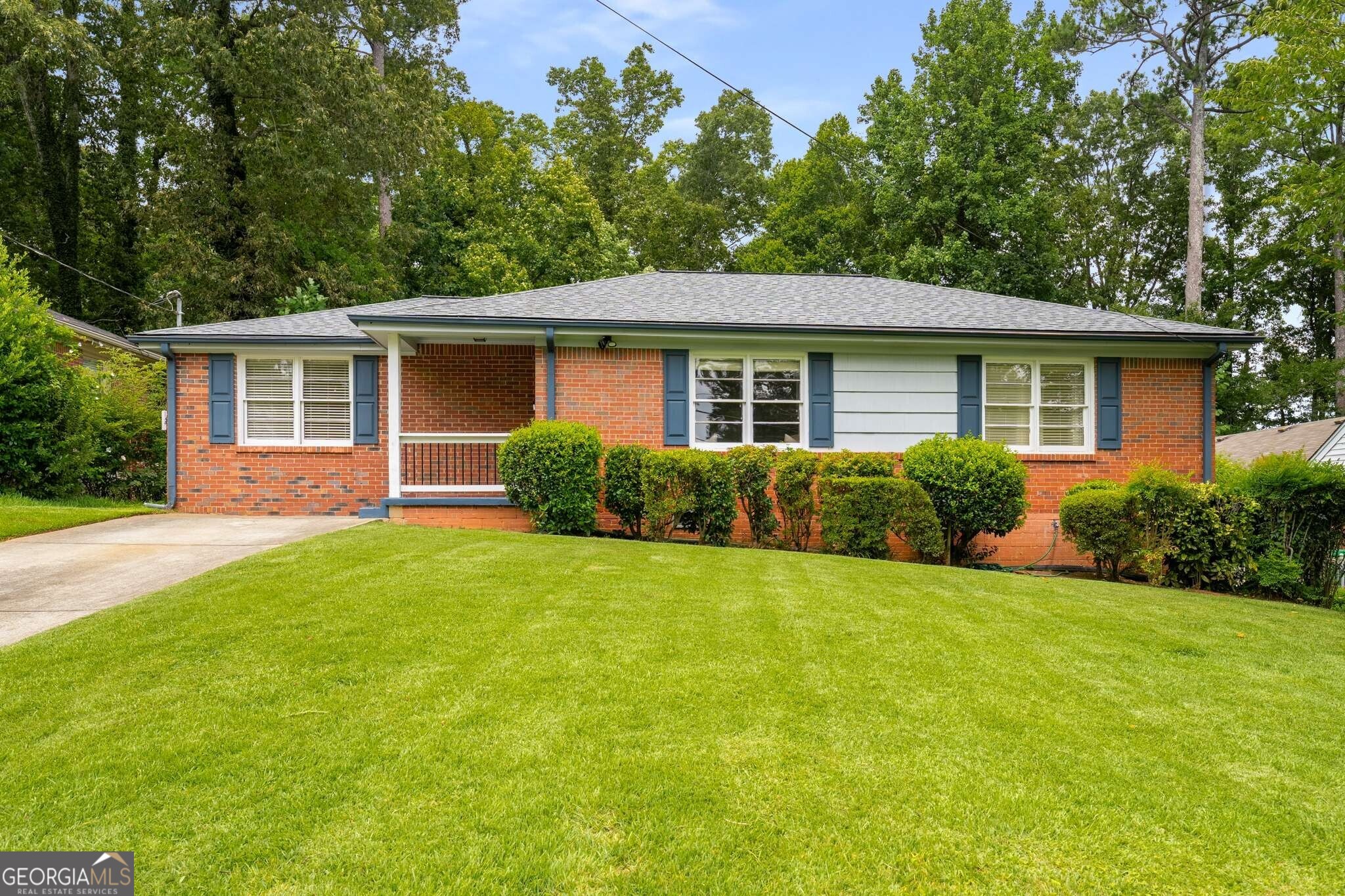This move-in ready brick ranch in charming Medlock Park sits on a private +/- 0.43-acre lot and has been updated with a renovated interior and all-new roof and gutters on the exterior. The interior boasts hardwood flooring, an updated kitchen showcasing white cabinetry and stone countertops, a dedicated dining room, three bedrooms, renovated bathroom and an enclosed carport that serves as a great flex space to suit the diverse needs of modern living. A screened-in back porch is ideal for year-round enjoyment, and the deck overlooks the lush and private yard. This vibrant and popular intown neighborhood is conveniently located near downtown Decatur and Toco Hills with proximity to restaurants, retail, schools, walking and biking trails, a Nature Preserve and community pool and playground. Enjoy the ideal combination of convenient city living with a local neighborhood feel!