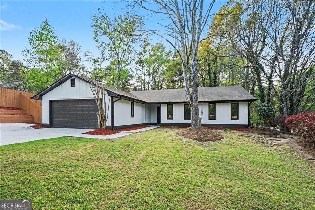 Photo of 1744 Sigman East Drive NW, Conyers, GA 30012 (MLS # 10736231)