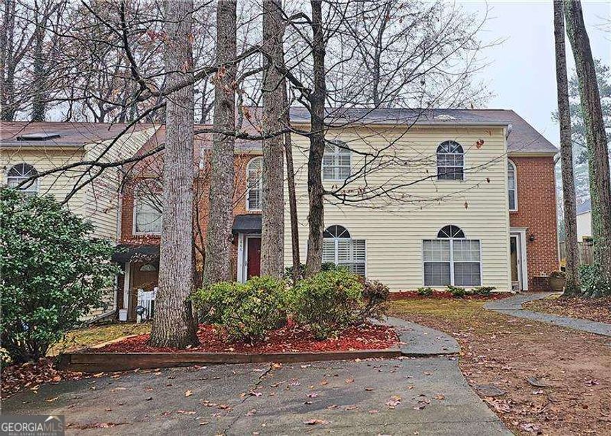 Large traditional floor plan with open Living Room with corner fireplace with open Dining room and Sunroom overlooking Large Deck with view to large open back yard. Kitchen with all new Stainless Steel appliances. Laundry Closet with (optional new) (washer & dryer) (as-is; no warranty) & half bath on main. Upstairs are 2 Master suites, each with walk in closets & private full baths. Front Master Bath with soaking tub & separate shower; New luxury vinyl plank flooring throughout and freshly painted; rent includes HOA. 2 car parking pad in front, Great location, will not last long.