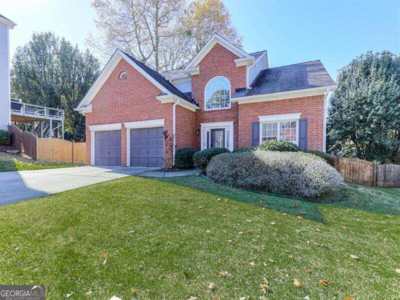 This beautiful, traditional brick-front home in Smyrna offers the perfect blend of classic charm and modern upgrades, ideally situated near the scenic Silver Comet Trail and local parks. Recently refreshed with new paint, hardwoods and carpet throughout, the interior feels bright, welcoming, and move-in ready.    A beautiful two story foyer welcomes you home! The heart of the home is a breathtaking chefCOs kitchen that is any cooks dream! Designed with functionality and style in mind, featuring top-of-the-line appliances, ample counter space, open live edge wood shelving and elegant finishes that will inspire culinary creativity. The kitchen provides a large breakfast area overlooking the fenced backyard and open to the oversized fireside family room!  The main level also offers a formal dining room plus a den/playroom/office space!  This floor plan is super functional and has so much to offer! Upstairs is three large bedrooms including a spacious owner suite. The upscale, remodeled master bathroom is a private retreat with luxury finishes, perfect for unwinding at the end of the day. It offers double vanity with lighted mirrors, soaking tub and spa-like walk-in shower!    Outside, enjoy a sprawling, fenced backyardCoa fantastic setting for outdoor gatherings, gardening, or simply relaxing in privacy while the large deck is great for grilling! The property sits on a generous cul-de-sac lot, offering both tranquility and a sense of community in this sought-after Smyrna location. Near shopping, restaurants, shopping, Braves stadium and more!!  Walking distance to schools. Wonderful home and area for all stages of life!