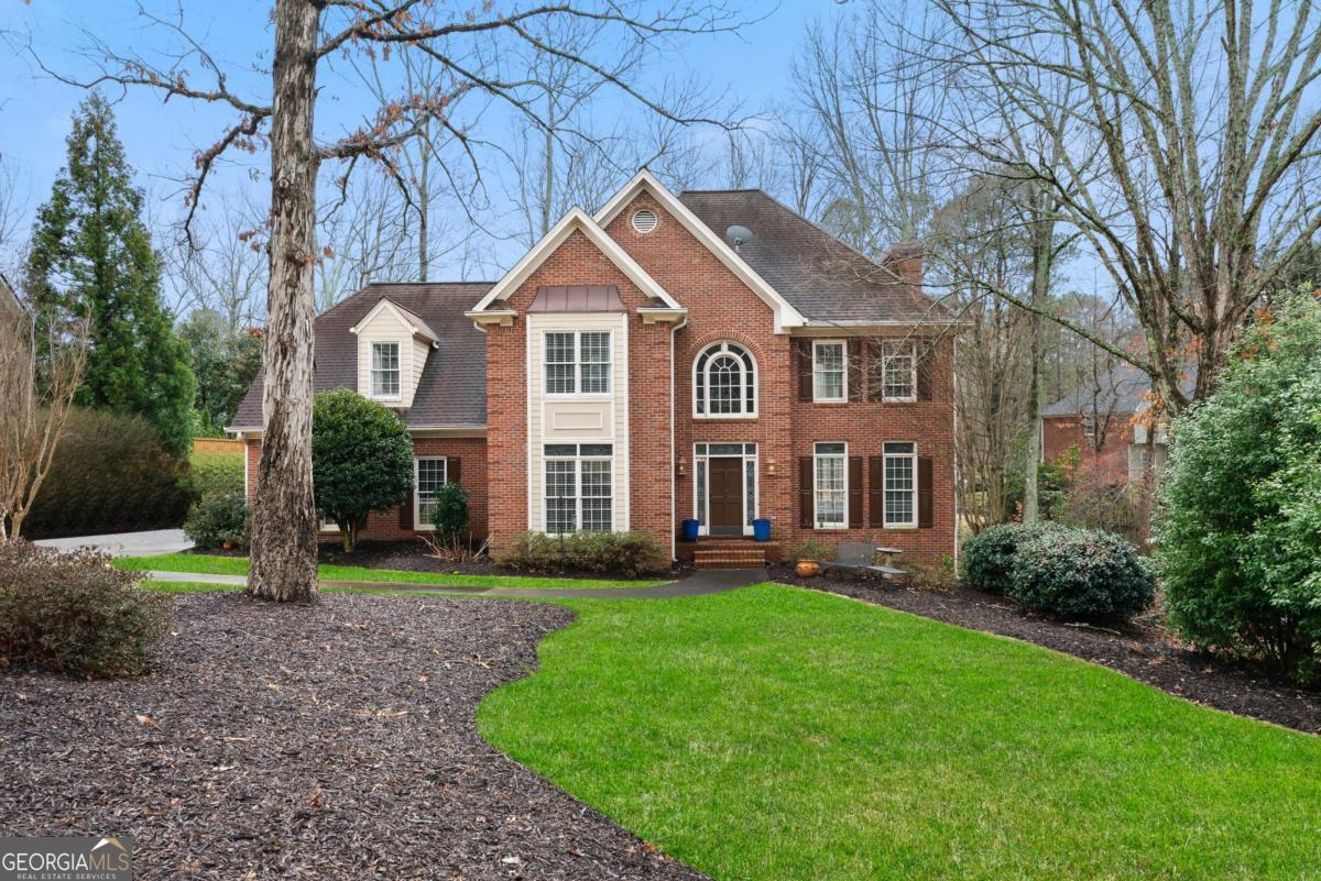 Price Improvement, Seller offering Buyer Credit! See private remarks for details. https://www.homes.com/property/2883-observation-point-nw-marietta-ga/fcmpz2zsg0hv6/ This breathtaking 5-bedroom, 4.5-bath brick traditional is a rare gem in an exclusive, amenity-rich swim-tennis community, offering an unparalleled blend of luxury, comfort, and tranquility on a sprawling half-acre lot. Designed with family living and effortless entertaining in mind, the open-concept first floor welcomes you with an abundance of natural light, seamless flow, and thoughtfully designed spaces. The bright and airy family room, anchored by a cozy fireplace, opens directly into the reimagined chefCOs kitchen, a culinary dream featuring sleek countertops, a stylish backsplash, ample pantry space, and high-end appliances. The sun-drenched breakfast nook is the perfect spot to start your day, while the formal dining room and separate living room provide elegant spaces for hosting. Front and rear staircases add to the homeCOs charm and functionality. Upstairs, the luxurious primary suite is a true sanctuary, boasting a spa-like en suite with a freestanding soaking tub, a designer glass-enclosed shower, and an expansive walk-in closet. Two secondary bedrooms share a Jack-and-Jill bath, while another bedroom offers its own private en suite, providing ultimate comfort and convenience. The fully finished basement is an entertainerCOs paradise, offering flexible spaces for a home theater, gym, game room, or guest retreatCocomplete with a private bedroom and full bath. Step outside to your private backyard oasis, where lush, wooded surroundings create a serene escape. Gather around the charming fire pit for cozy nights under the starsCoa space that truly captures the magic of outdoor living. The oversized garage storage system and generous pantry and closet spaces ensure that functionality meets style in this exceptional home. Located in a quiet, sought-after neighborhood, this home offers the best of modern living while maintaining a peaceful, private feel. DonCOt miss this rare opportunity to own a home that blends elegance, comfort, and nature in one perfect package. Schedule your tour today! Includes virtually staged photography.