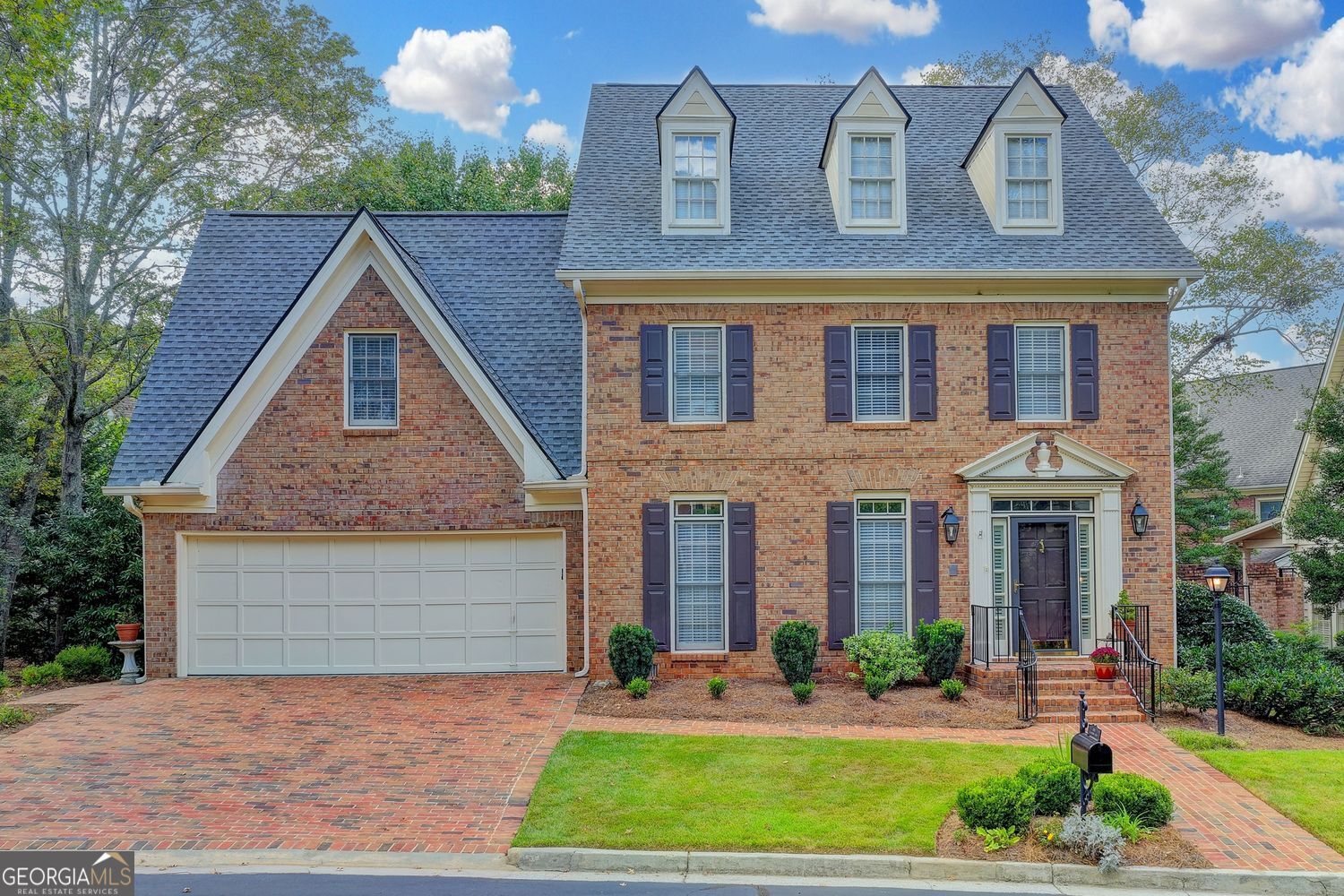 Are you searching for the perfect home in the perfect Dunwoody location, at a perfect price and move in ready? Time to unpack! This charming 2 story brick across from Dunwoody Country Club and walking distance to shopping, grocery stores and restaurants is the lifestyle you have been searching for. Brand new roof, 9 ft ceilings on the main, and fireside keeping room. Renovated white kitchen with a large deck overlooking your yard, perfect for that morning coffee. A large dining room is ready for family gatherings and entertaining. Upstairs an oversized master awaits with a large walk-in closet and gorgeous renovated master bath. An additional 2 bedrooms up and hardwoods throughout the main. This sought after community of the Woodlands has all the amenities, a strong HOA, community Pool and Clubhouse and yard Maintenance for that stress free lifestyle. In addition to great walkability, you are minutes to GA-400, I-285, Sandy Springs and Buckhead, Roswell, and Alpharetta. This home is a true gem!