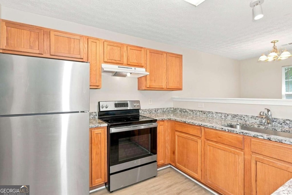 Photo of 5604 Windfall Lane, Lithonia, GA 30058 (MLS # 10836711)